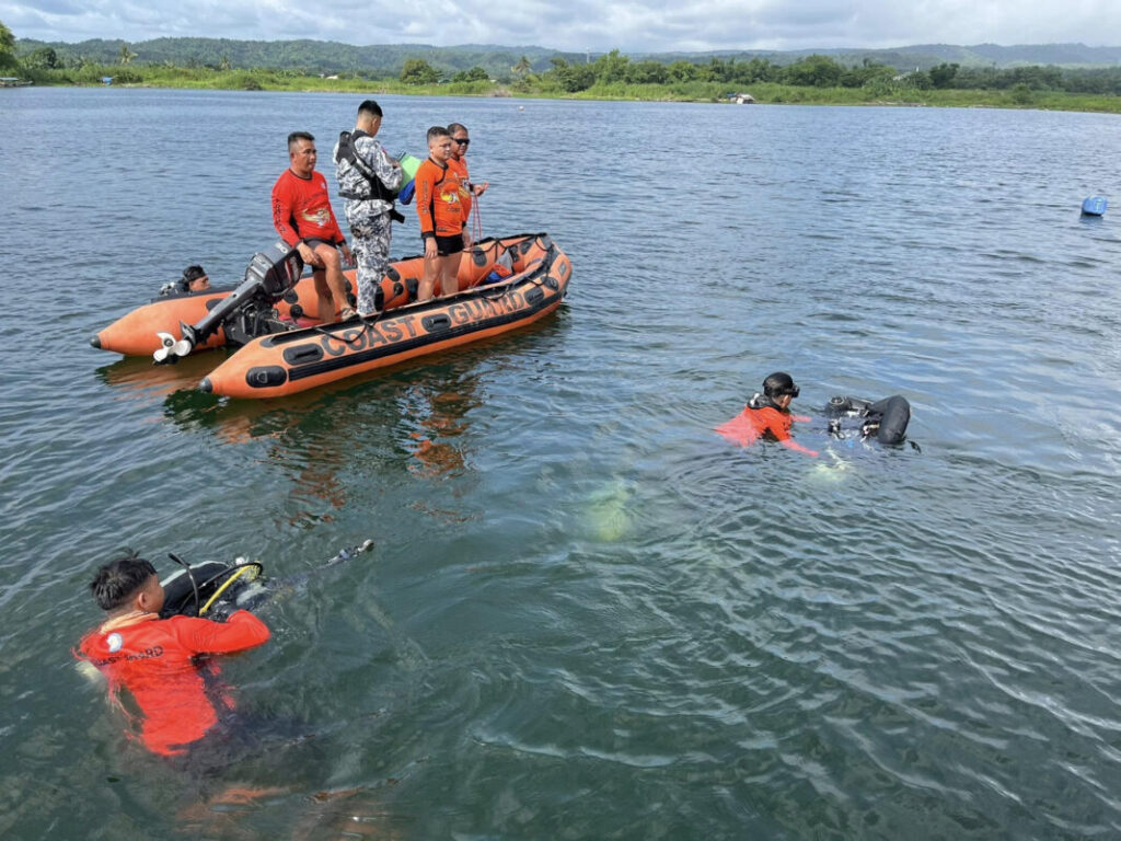 Hallan posibles restos humanos en lago volcánico al buscar a 34 desaparecidos en Filipinas